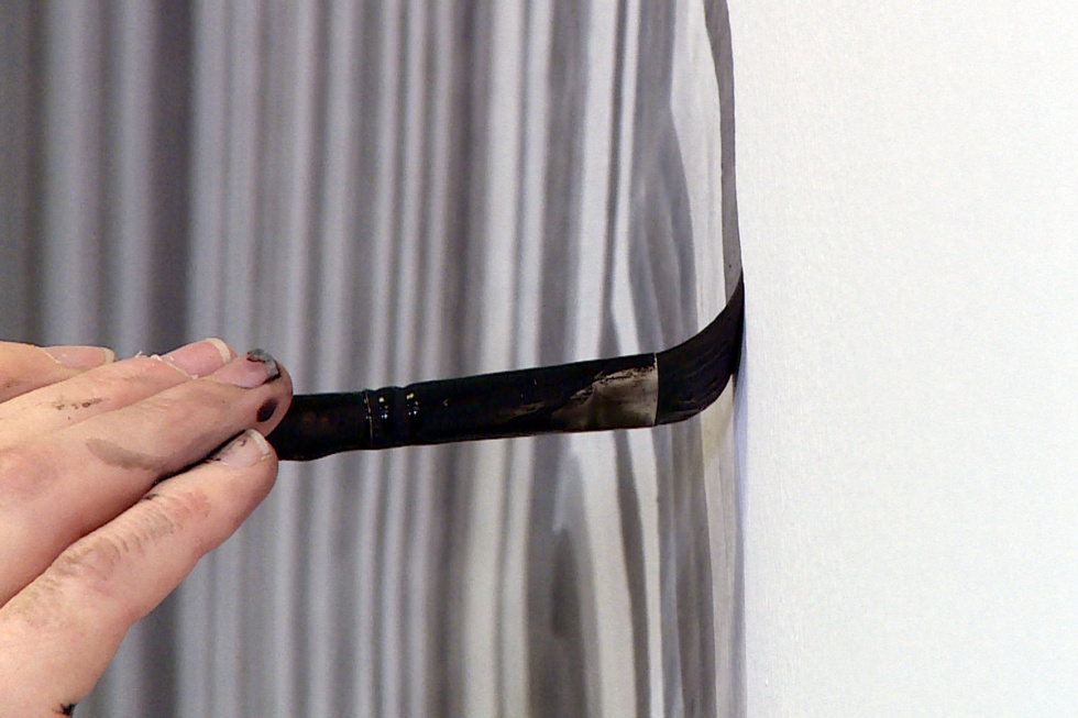 das Foto zeigt eine zeichnende Hand